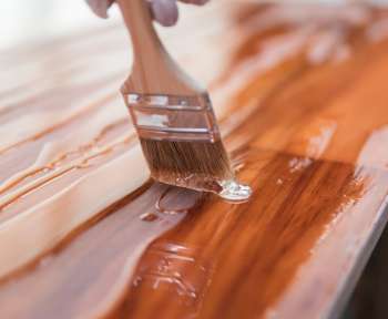 brown wooden handle brush on brown wooden table