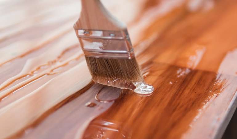 brown wooden handle brush on brown wooden table